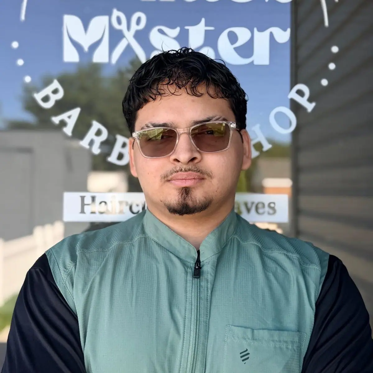 Jaisson, barber at Primos Master Barbershop